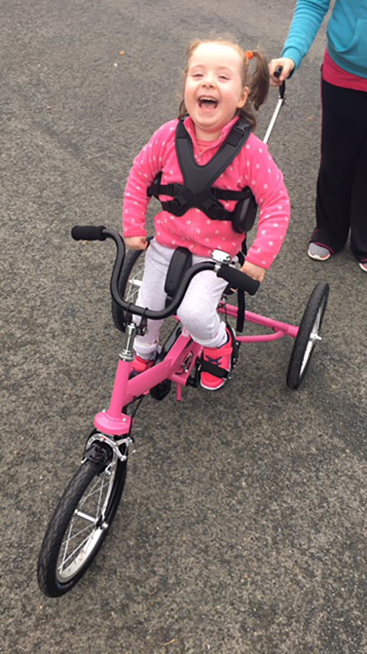 Maeve’s Happy Face Says Her Tomcat Trike Is Great